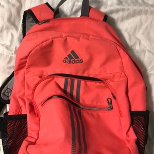 Pink adidas school backpack.